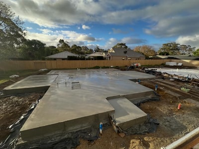 Finished residential slab with set-downs and service penetrations